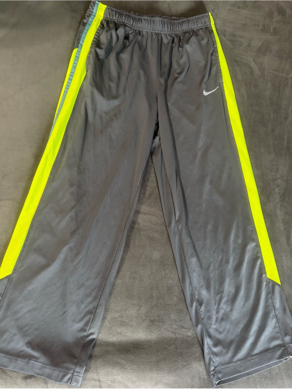 Nike Kids Black Sweatpants with Neon Yellow Side Panels